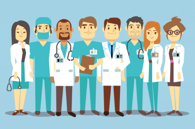 doctors, nurse and pharmacist standing in front of blue wall