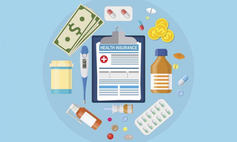 Health insurance form, some medicines like capsules and tablets and money lying on a blue counter